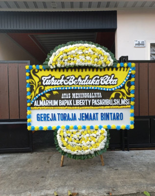 Papan Bunga Duka di Babakan Surabaya